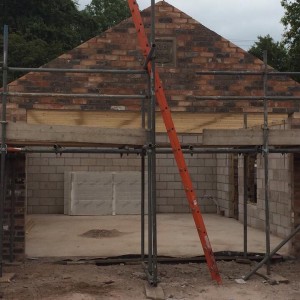 New build garage using reclaimed brick 
